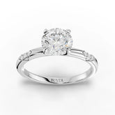 1.11 CT round solitaire accent lab diamond ring with 1 CT center, four-prong setting, slim band, and trio side diamonds