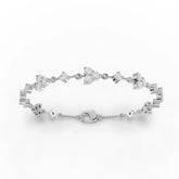Floral diamond cluster bracelet in white gold
