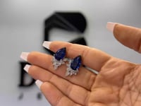 Blue Teardrop Gemstone Earrings · Sparkling Diamond Cluster Setting