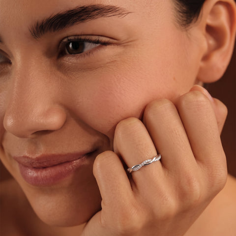 0.08 CT Round Twisted Infinity Lab Grown Diamond Band, worn on the hand 2