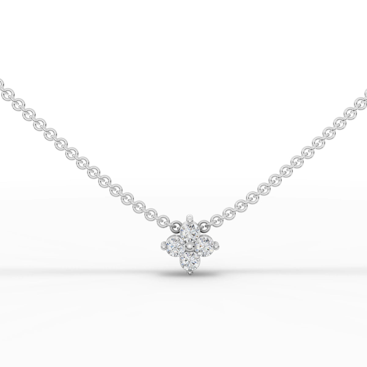 A delicate floral pendant featuring four round lab-grown diamonds set in 18k gold, harmonious and suitable for everyday wear.