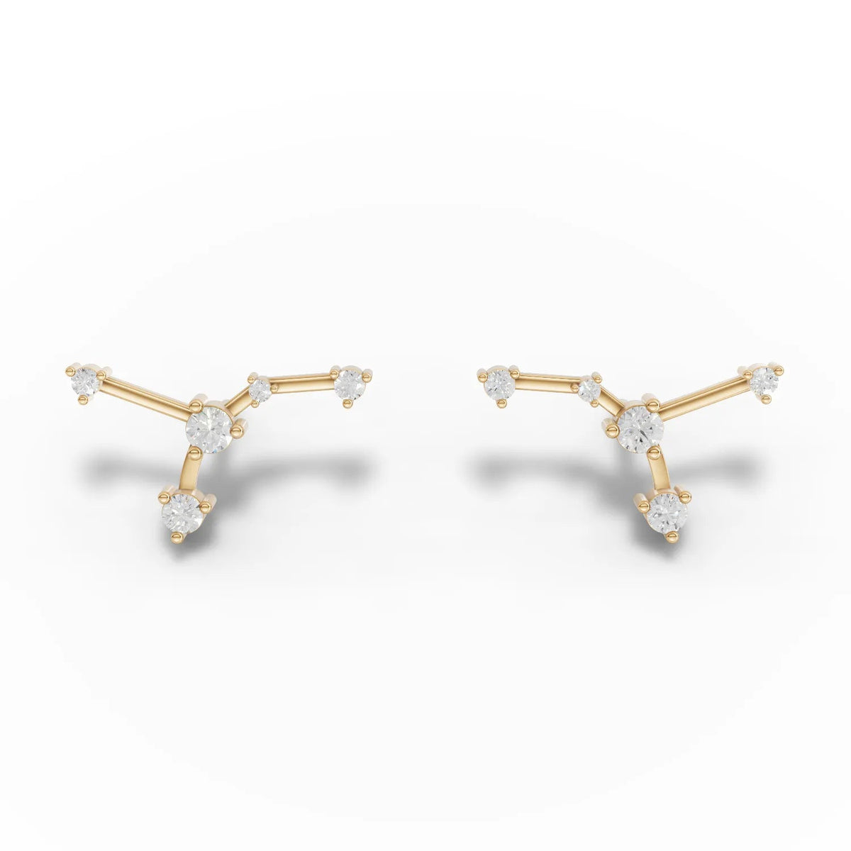 Cancer constellation earrings feature round lab-grown diamonds set in 18K gold, arranged to reflect the zodiac pattern.
