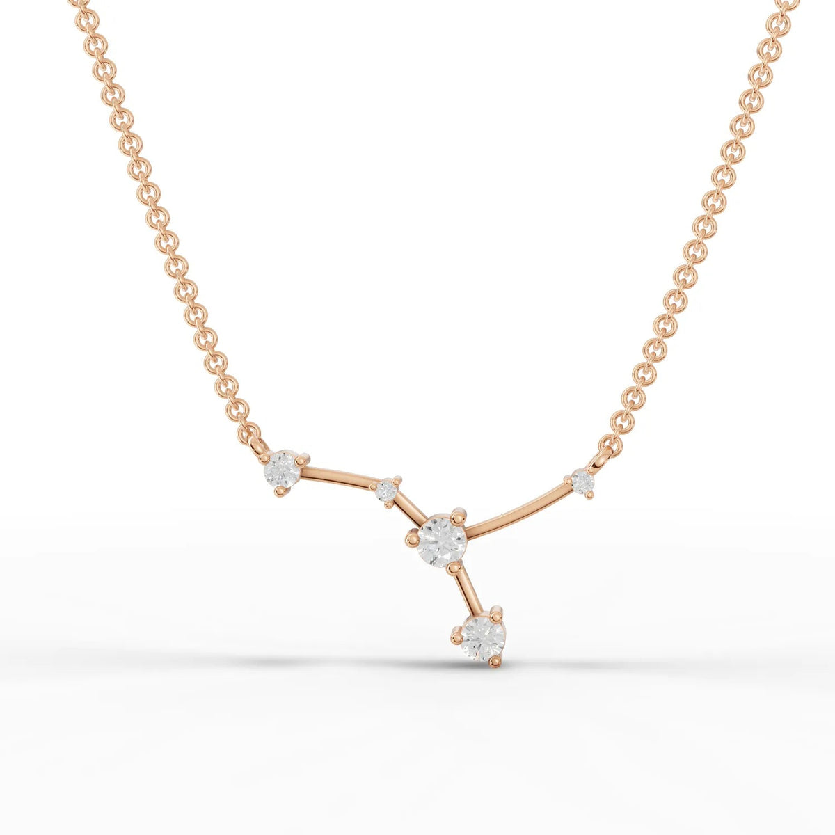 Delicate 0.22 Ct Cancer lab diamond pendant in polished 18K gold, featuring round diamonds arranged in constellation pattern.
