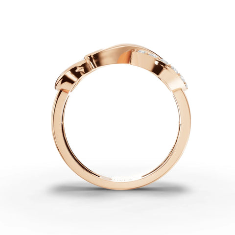 The 0.24 Ct Infinity Loop Pavé Lab Diamond Ring features a polished 18K gold band with one diamond-set loop and one smooth loop, showcasing a sleek infinity design.