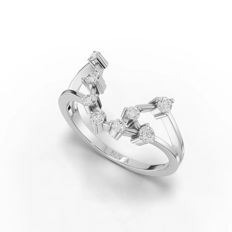 Sculptural 18k gold ring featuring 0.24 Ct round lab grown diamonds in an open dual-band design inspired by the Aquarius constellation.