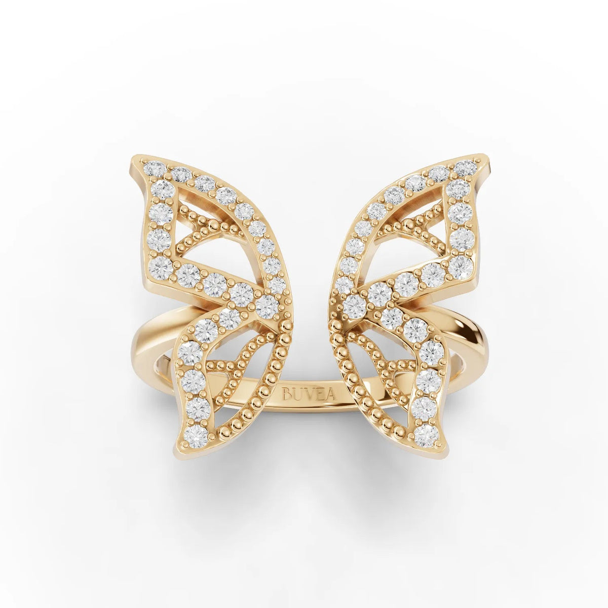 Butterfly motif ring in 18K gold featuring a delicate open design with round lab grown diamonds set in micro-prongs.