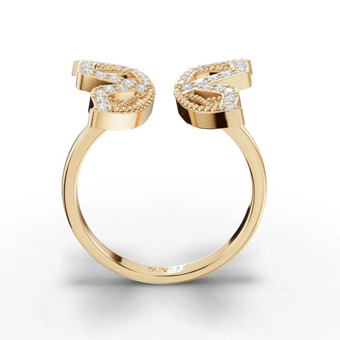 Open ring in 18K gold featuring a butterfly motif with round lab grown diamonds in micro-prong settings.