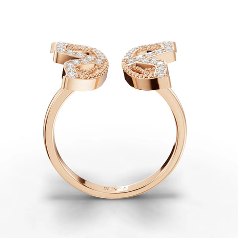 Open ring with butterfly motif, featuring round lab grown diamonds in a micro-prong setting, finished in 18K gold.
