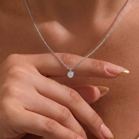0.25 Ct Round Bezel Solitaire Lab Grown Diamond Pendant, worn on the neck 2