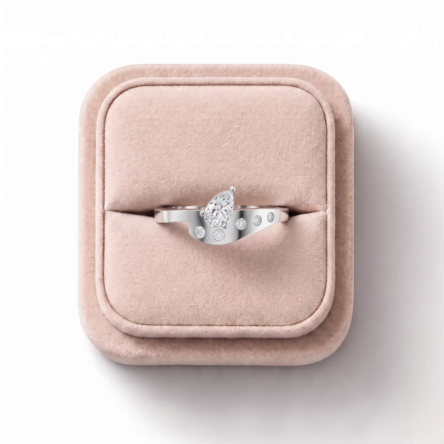 0.27 CT Pear Lab Grown Diamond Flush Ring, on a white background
