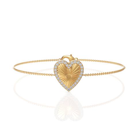 Heart-shaped centerpiece bracelet in 18K gold, adorned with round pavé-set lab-grown diamonds, featuring a sunburst texture.