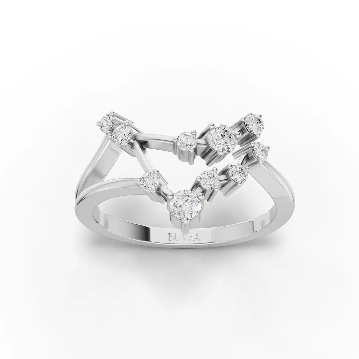 A refined 18K gold ring featuring round lab-grown diamonds arranged to represent the Capricorn constellation.