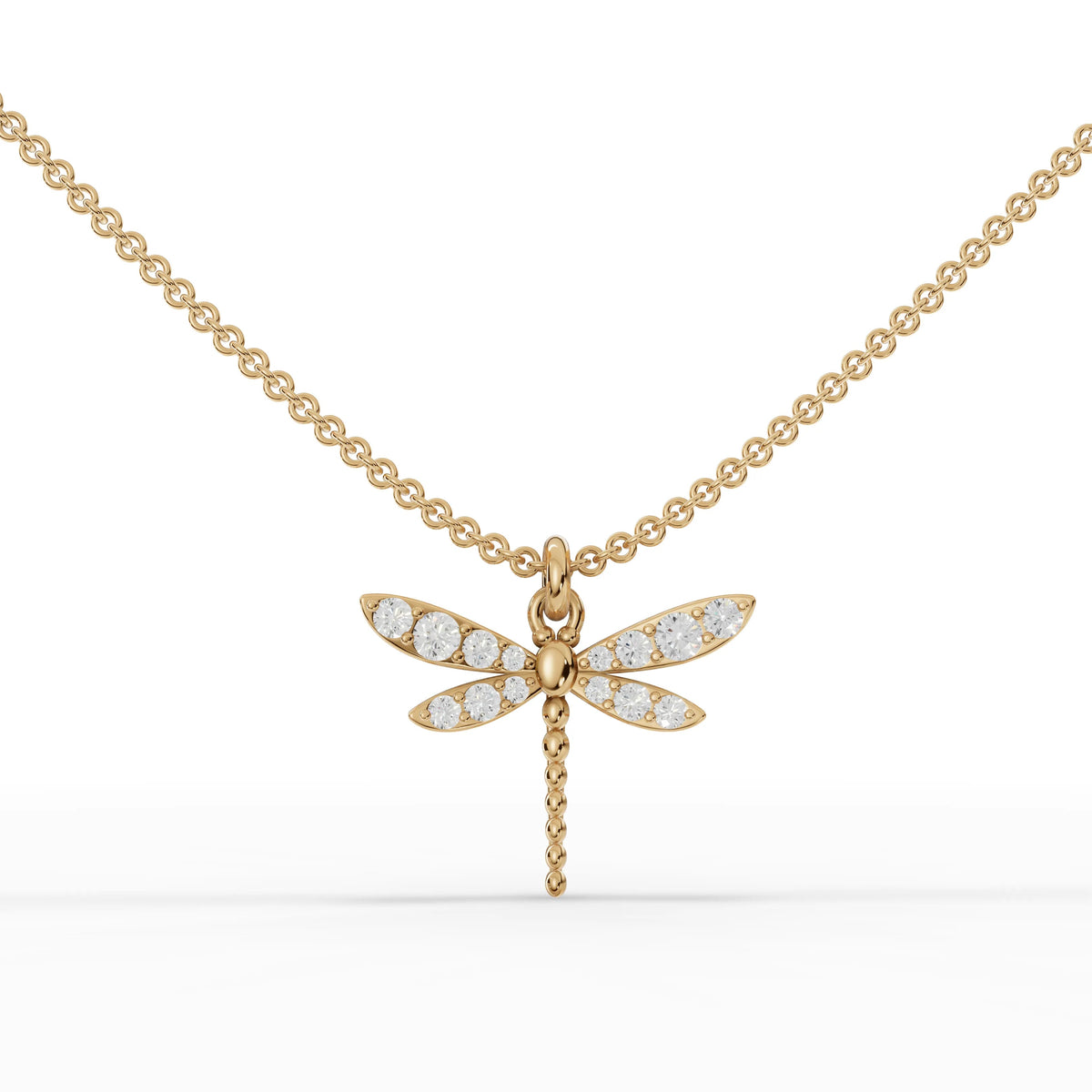 0.33 Ct dragonfly pendant in polished 18k gold, adorned with round lab grown diamonds and featuring elongated wings.