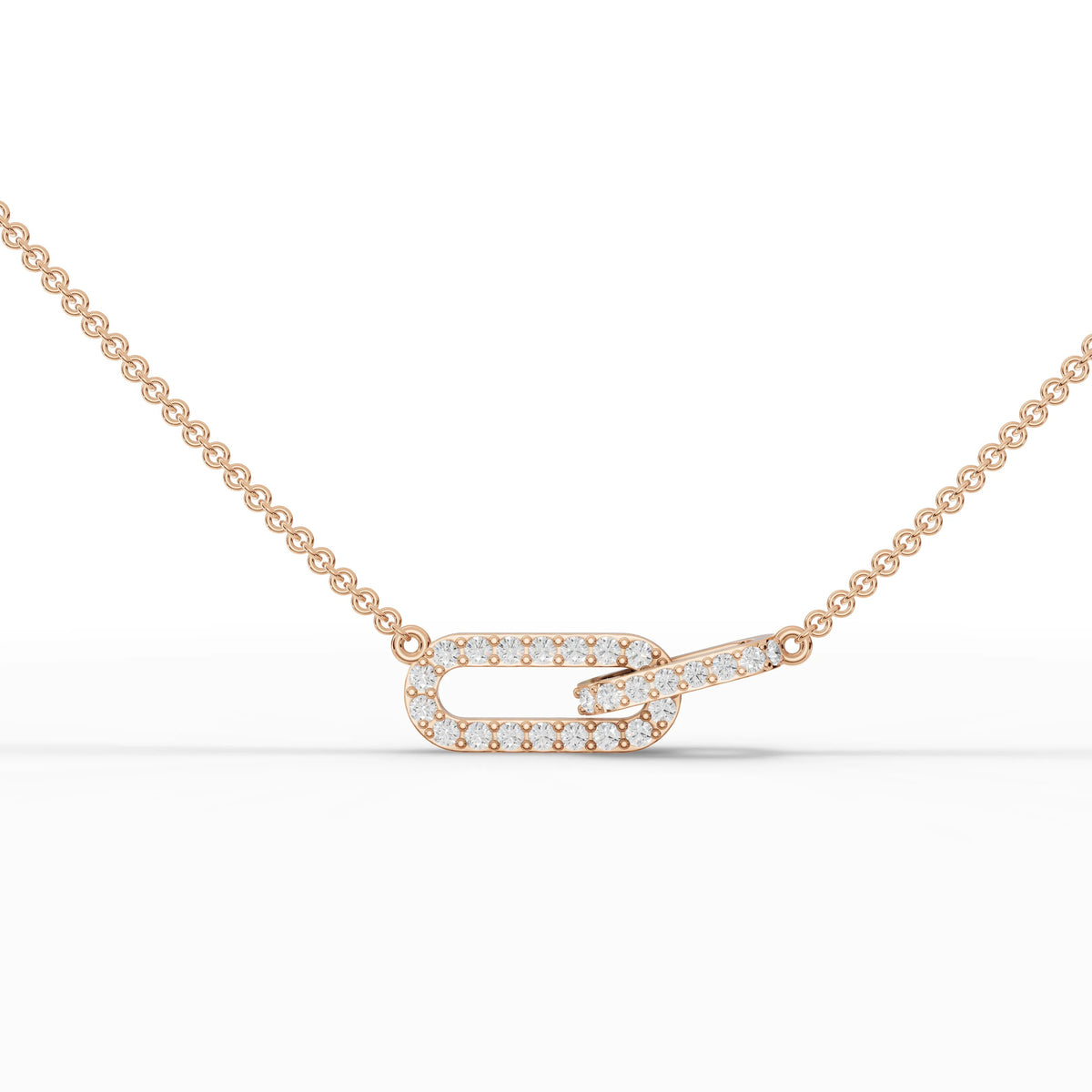 Interlocking link pendant in 18k rose gold, featuring round brilliant lab grown diamonds in a micro prong setting.