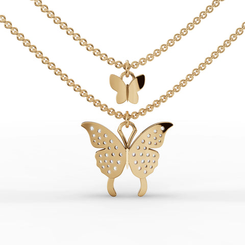 18k gold lab diamond pendant featuring a double butterfly design, with a larger lower butterfly and a smaller upper butterfly, adorned with round brilliant diamonds.