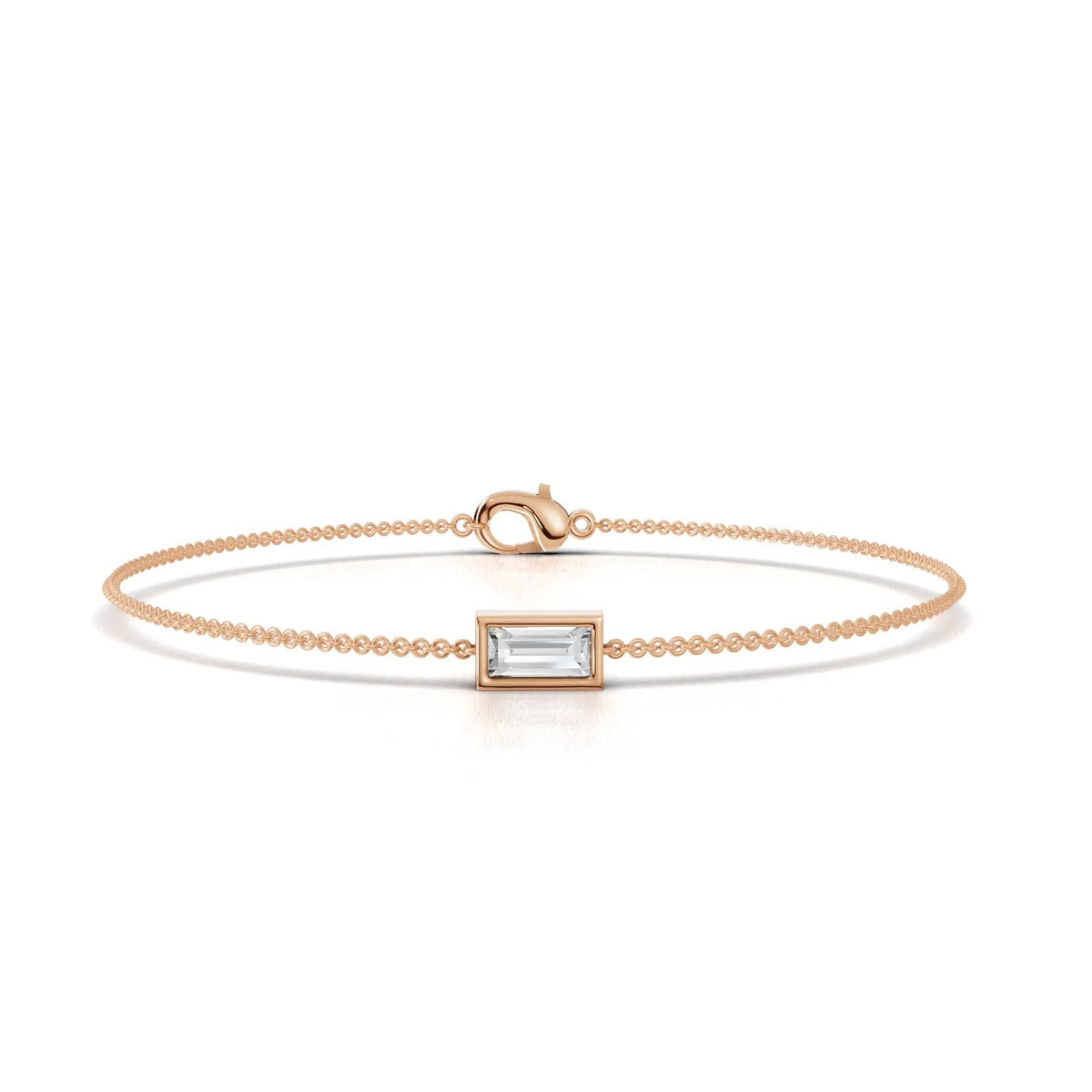 Delicate 18k gold bracelet featuring a center baguette lab-grown diamond in a rectangular setting, with a polished finish.