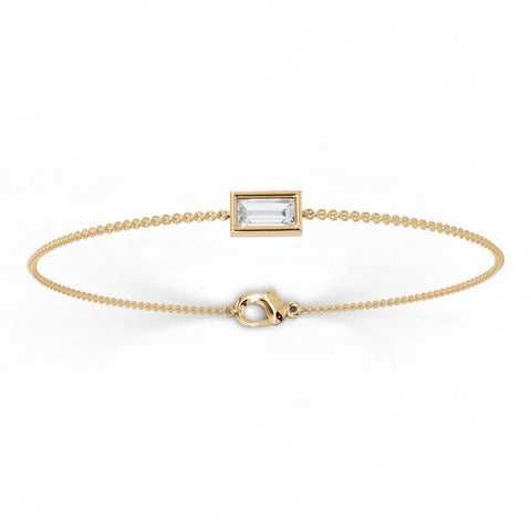 Baguette lab-grown diamond bracelet in 18k gold, featuring a delicate chain and secure clasp for a refined everyday look.