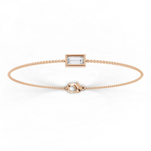Baguette lab diamond bracelet in 18k gold, featuring a rectangular setting and fine chain for a smooth, elegant drape.