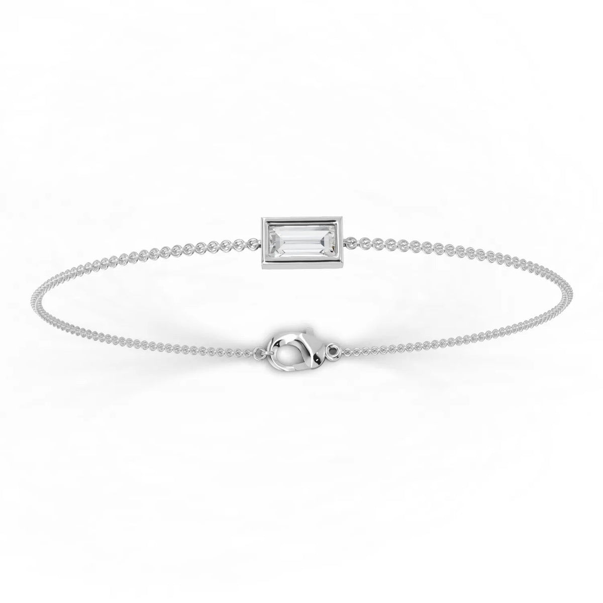 Baguette lab diamond bracelet in 18k gold, featuring a sleek design with a clear rectangular center stone and delicate chain.