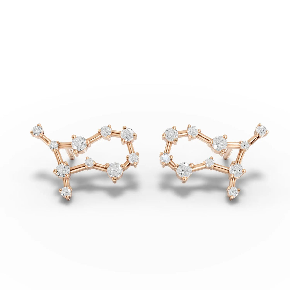 Gemini constellation lab-grown diamond earrings in 18K gold, featuring round diamonds arranged in a geometric pattern.