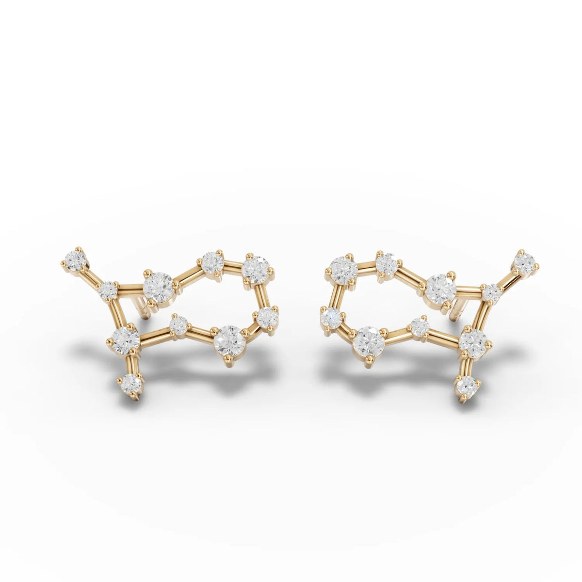 0.41 Ct Gemini lab diamond earrings in 18K gold, featuring a constellation design with round lab-grown diamonds.