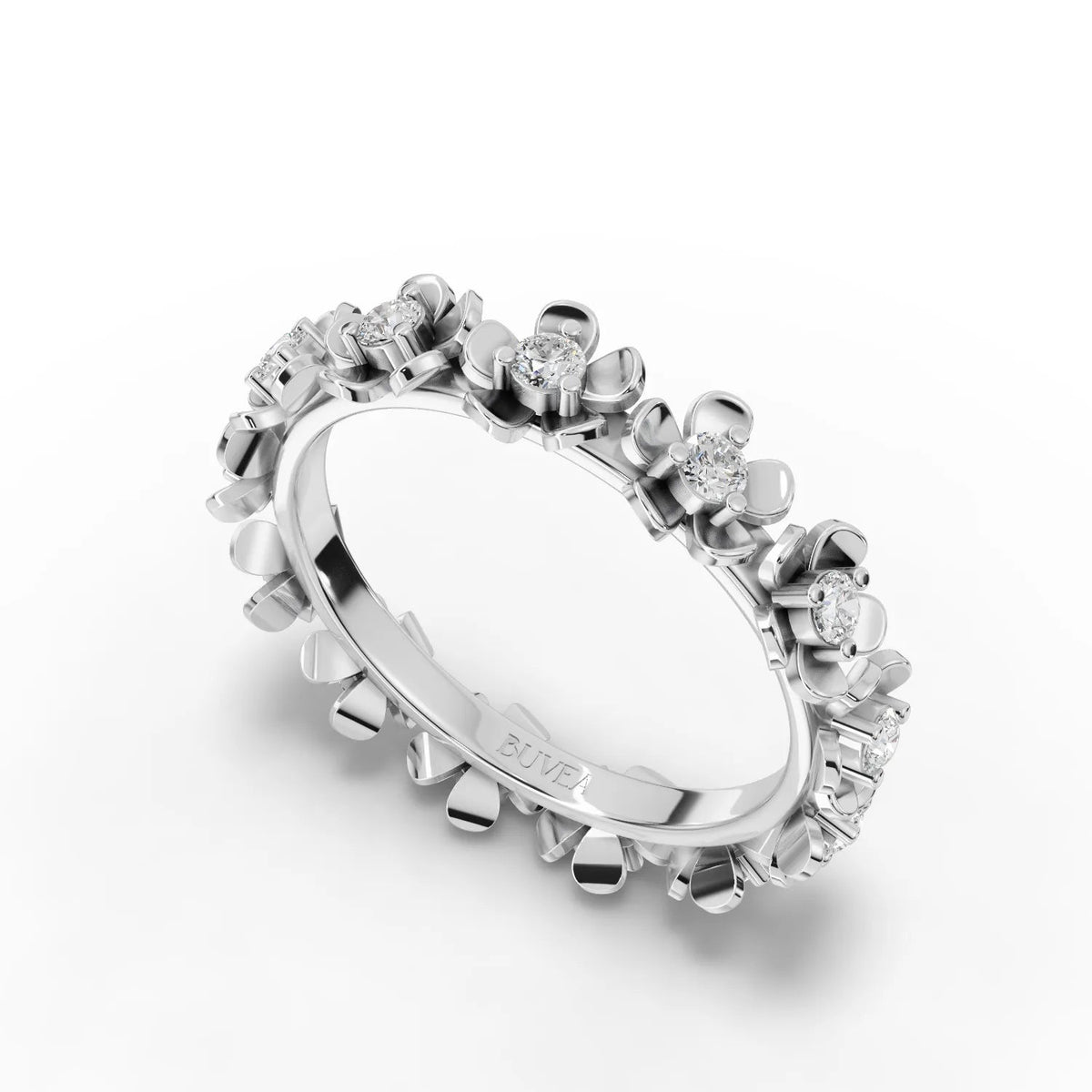 Floral eternity ring in polished 18K gold, featuring round lab grown diamonds set in a delicate flower design.