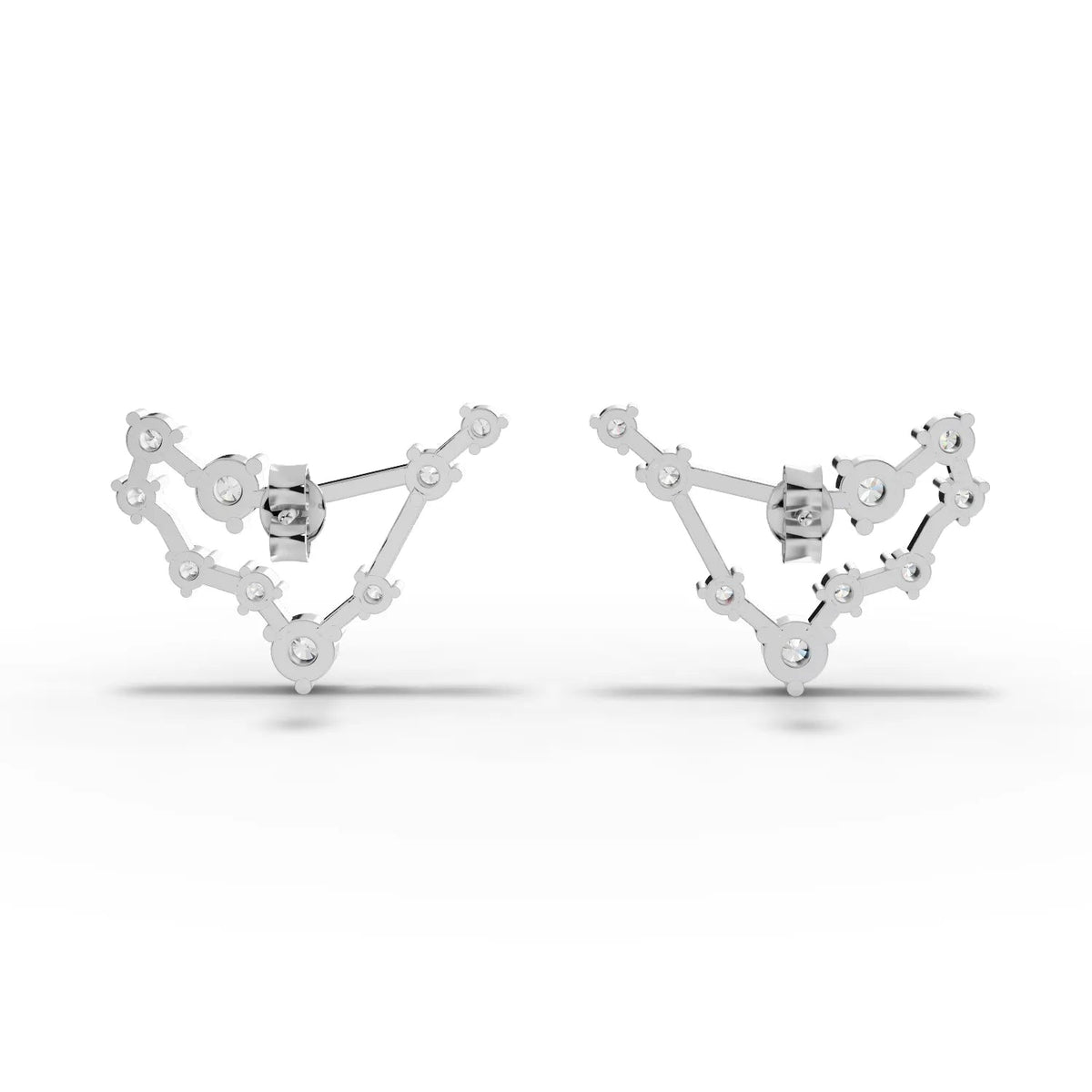 Lab grown diamond earrings featuring a Capricorn constellation design, crafted in 18K gold with round diamonds in prong settings.