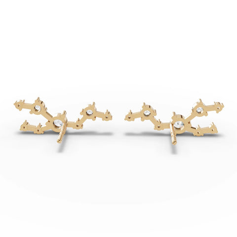 Taurus constellation lab-grown diamond earrings in 18K gold, featuring round diamonds in a distinctive layout.