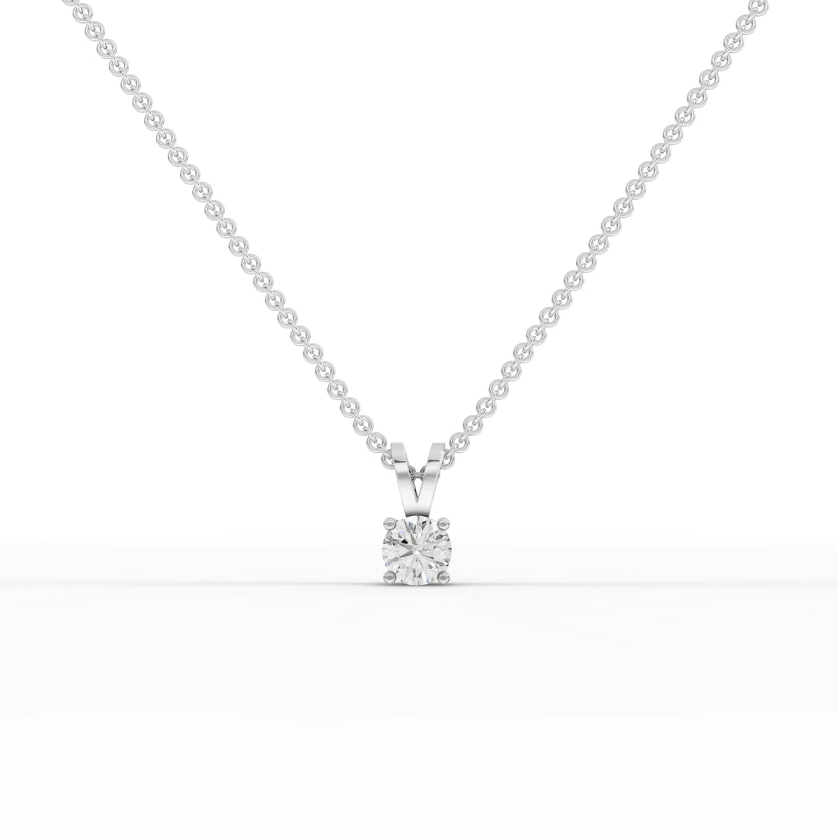0.50 ct round lab grown diamond solitaire pendant necklace with four-prong setting and V-shaped bail in gold