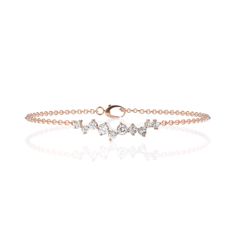 Delicate 18K gold bracelet featuring a linear cluster of round lab-grown diamonds, secured with a secure clasp.