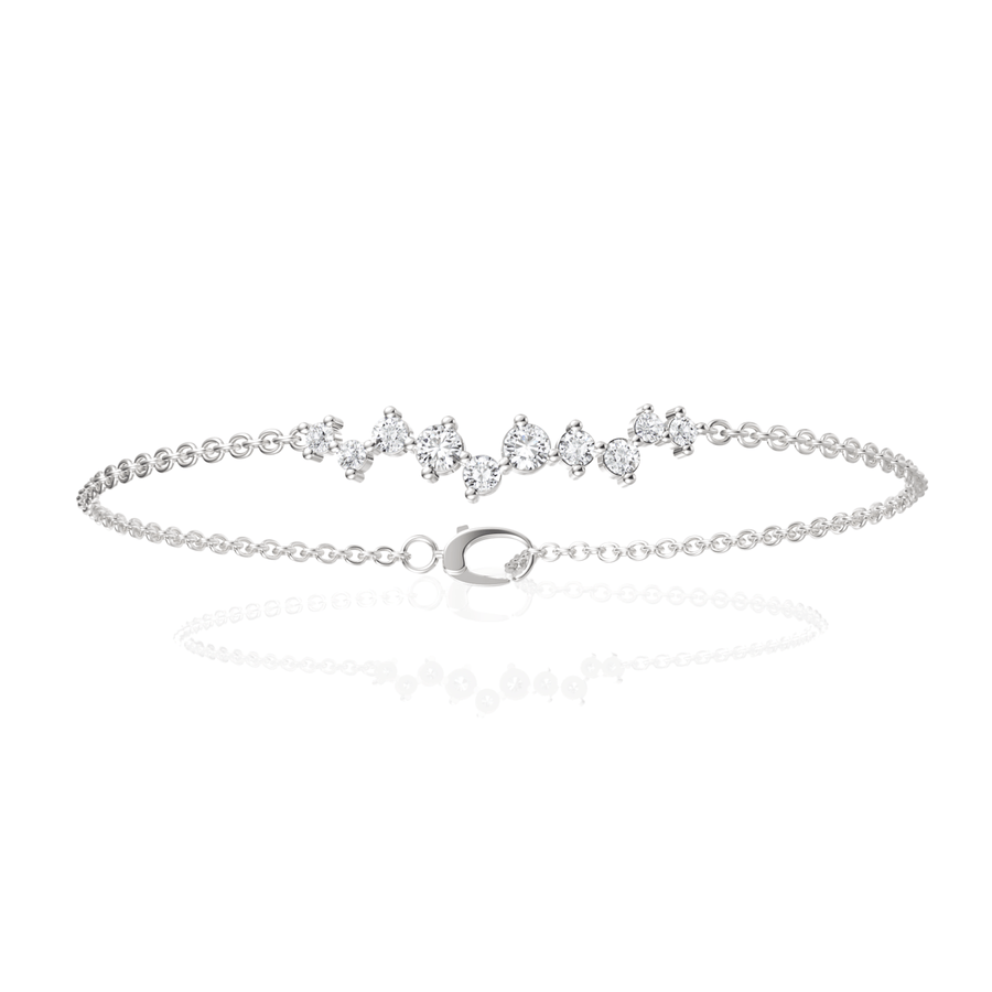 Delicate 18K gold bracelet featuring a linear cluster of round lab grown diamonds, totaling 0.50 Ct, with a secure clasp.