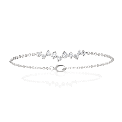 Delicate 18K gold bracelet featuring a linear cluster of round lab grown diamonds, totaling 0.50 Ct, with a secure clasp.