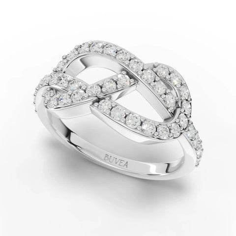 0.53 CT infinity motif lab diamond ring in 18K gold, featuring intertwined curves with round diamonds in micro-prong settings.