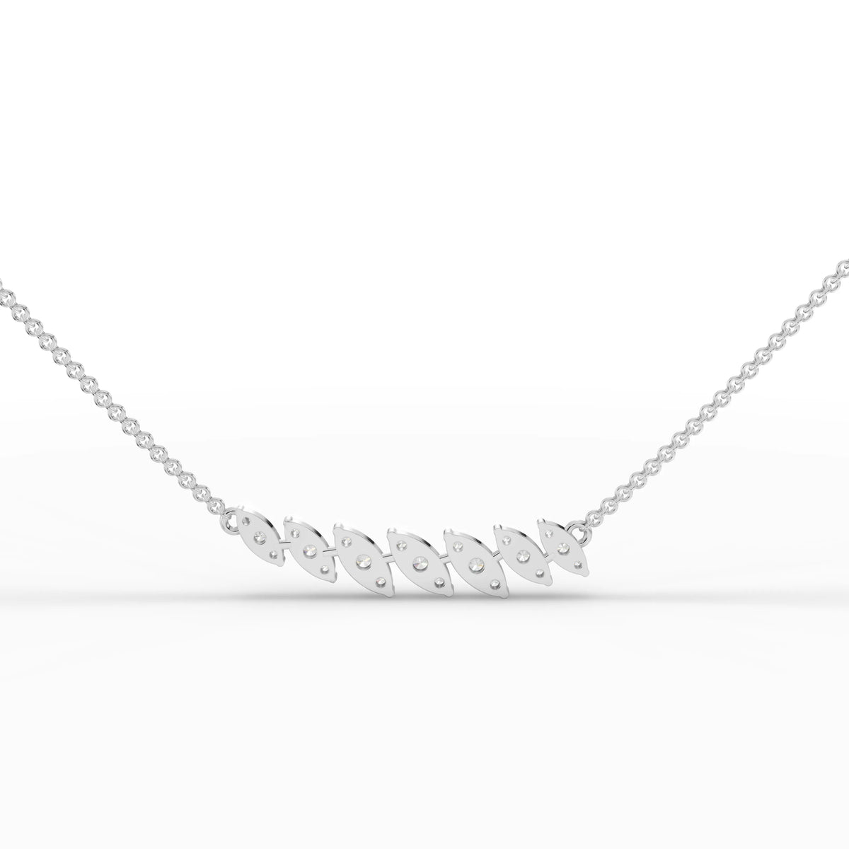 Elegant marquise leaf pendant in 18k gold, adorned with round brilliant lab grown diamonds in a cascading leaf design.