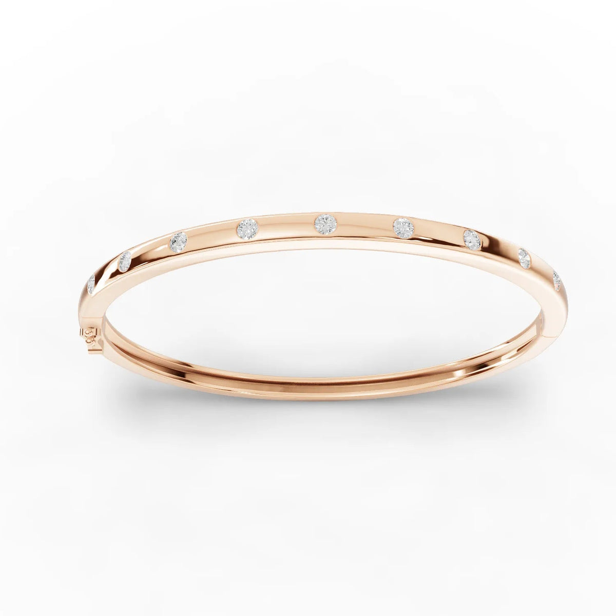 Elegant rose gold bangle featuring evenly spaced round lab-grown diamonds, designed for a smooth, low-profile fit.