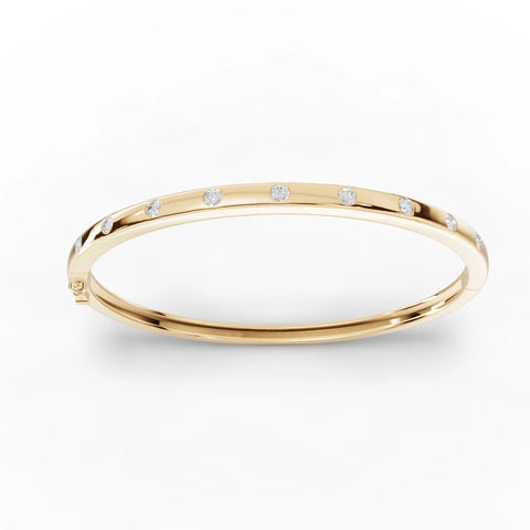 18K gold bangle with evenly spaced, flush-set round lab-grown diamonds totaling 0.54 CT for a smooth, low-profile look.