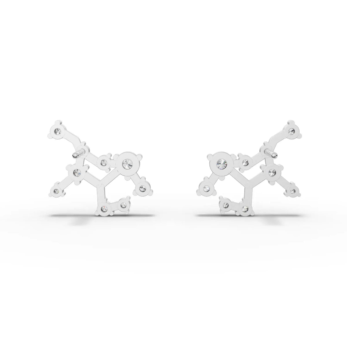 Virgo constellation earrings featuring round lab-grown diamonds set in a delicate 18K gold framework.