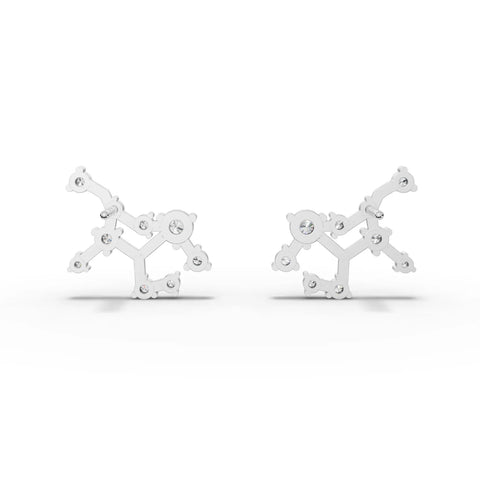 Virgo constellation earrings featuring round lab-grown diamonds set in a delicate 18K gold framework.