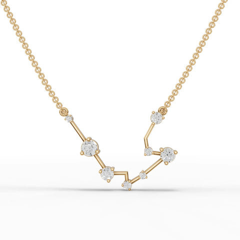 Aquarius constellation pendant featuring 0.57 Ct round lab grown diamonds, set in an 18k gold V-shaped chain.