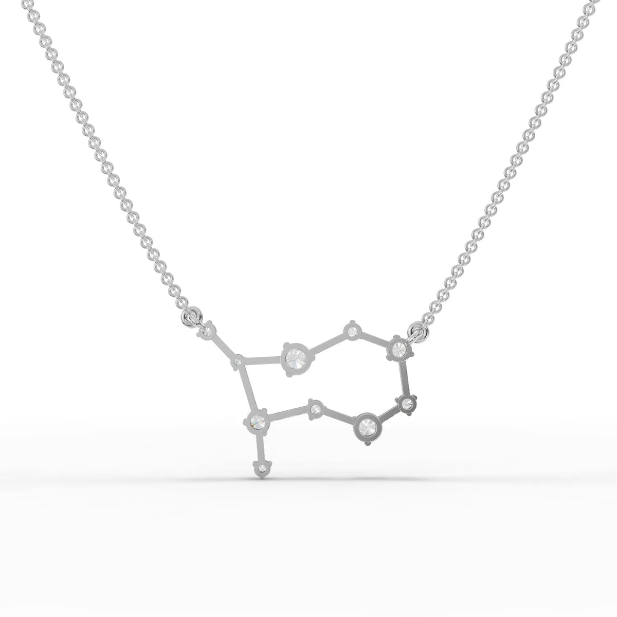 Gemini constellation pendant featuring 0.58 ct round lab-grown diamonds set in polished 18K gold, with precise geometric design.