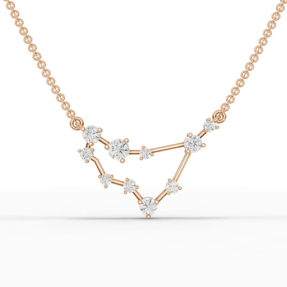 0.61 Ct Capricorn lab diamond pendant in polished 18K gold, featuring round diamonds arranged in a V-shaped constellation.