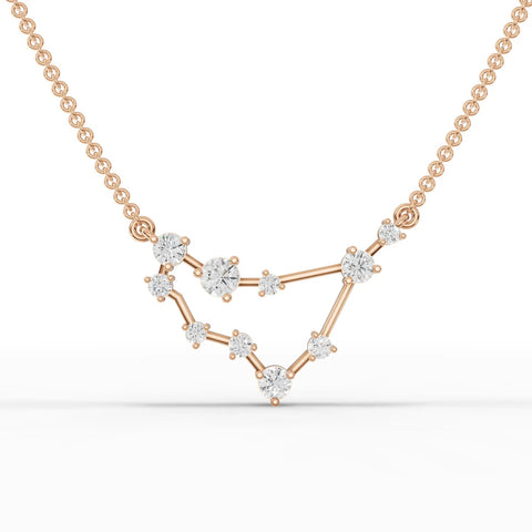 0.61 Ct Capricorn lab diamond pendant in polished 18K gold, featuring round diamonds arranged in a V-shaped constellation.