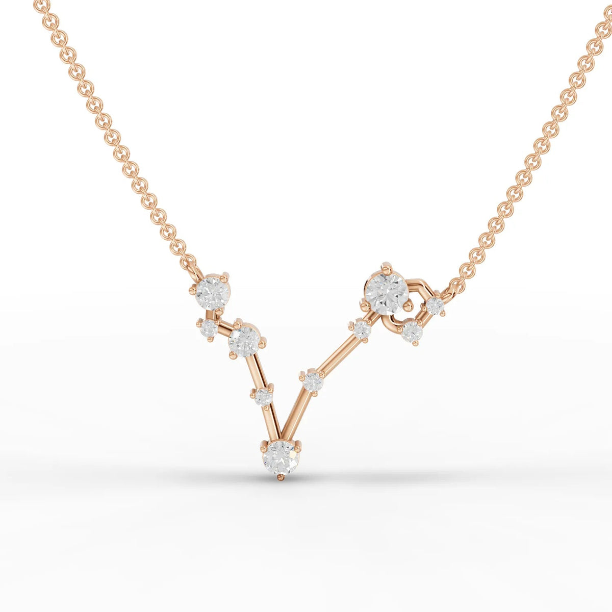 0.61 Ct Pisces lab diamond pendant in 18K rose gold, featuring round diamonds arranged in a celestial V shape.