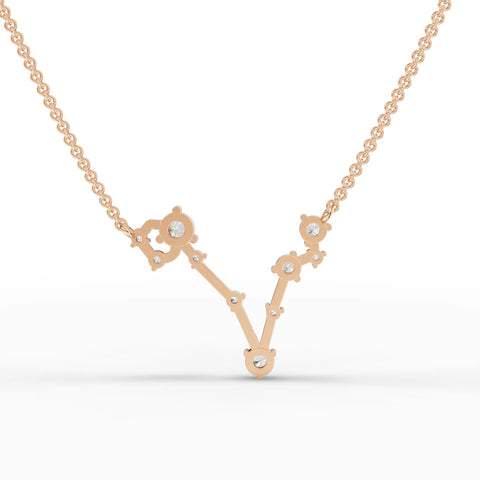 Elegant 18K gold Pisces pendant featuring 0.61 CT round lab grown diamonds, showcasing constellation-inspired design.