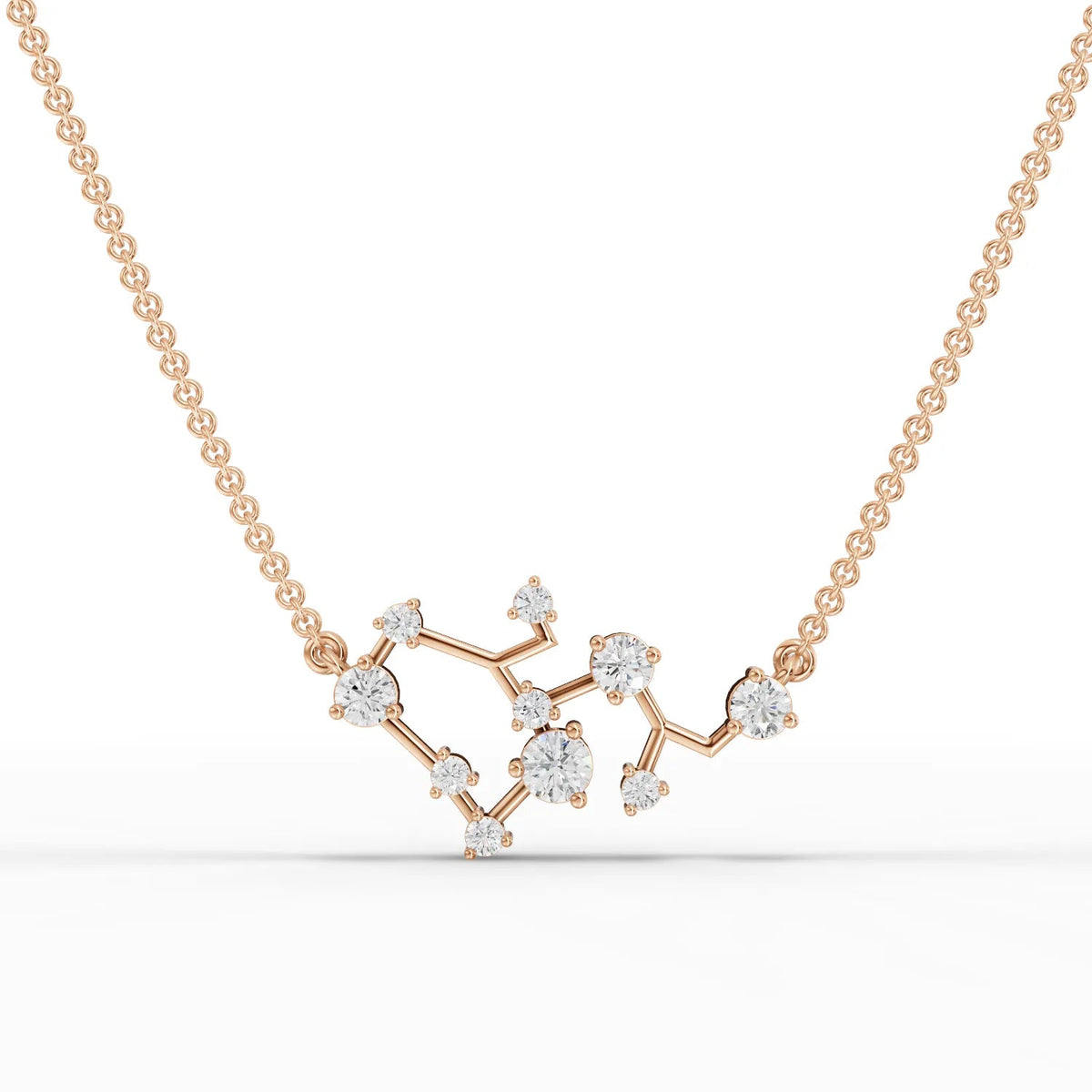Sagittarius lab-grown diamond pendant in 18K gold, featuring round diamonds arranged in a constellation pattern.