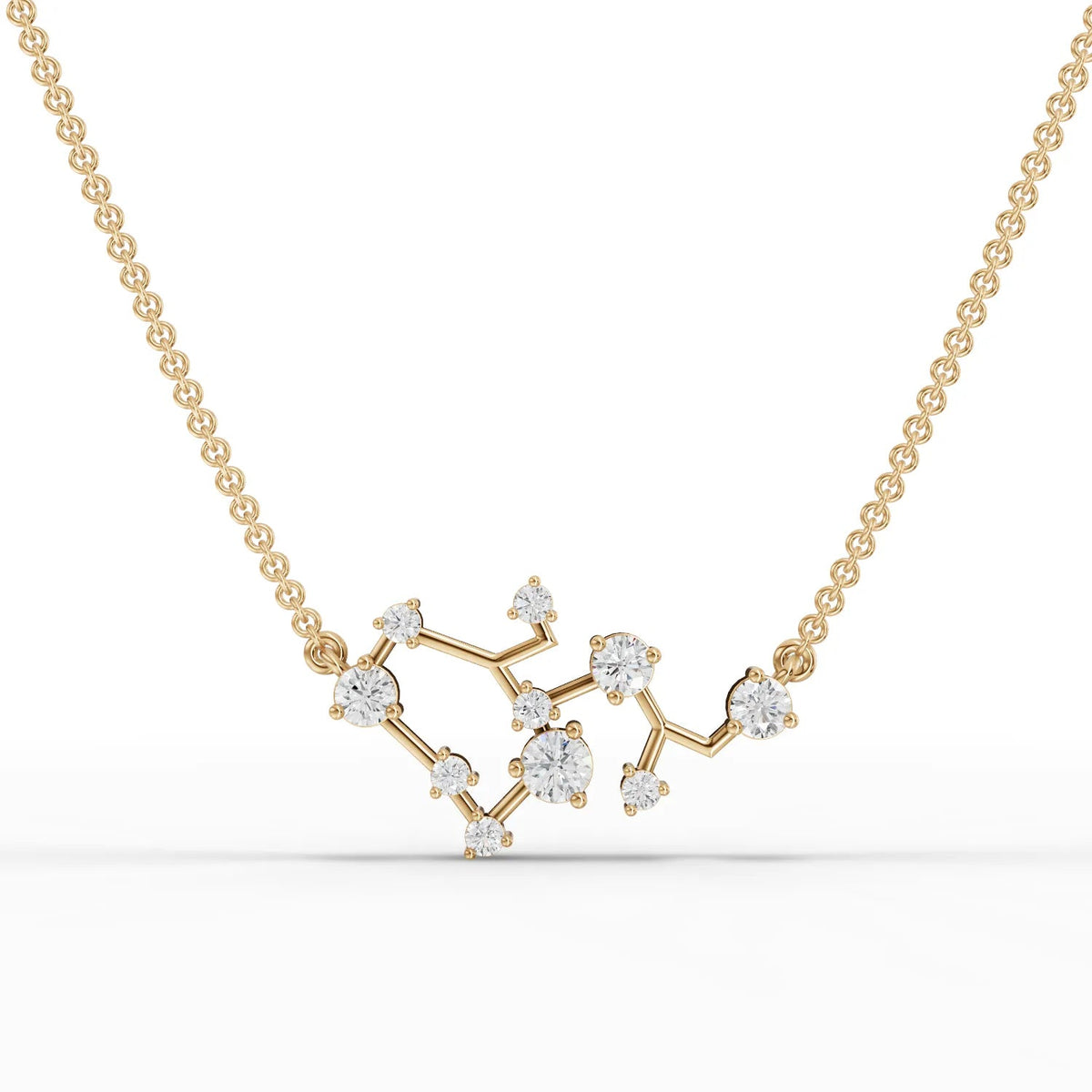 Sagittarius lab diamond pendant in 18K gold featuring round lab-grown diamonds arranged in constellation pattern.