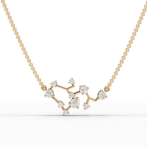 Sagittarius lab diamond pendant in 18K gold featuring round lab-grown diamonds arranged in constellation pattern.