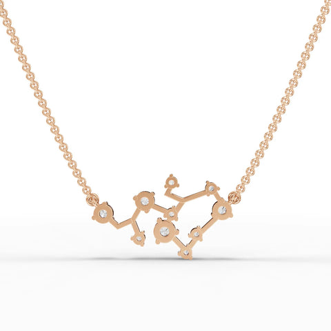 Delicate 18K gold Sagittarius lab-grown diamond pendant featuring a constellation design with round diamonds.