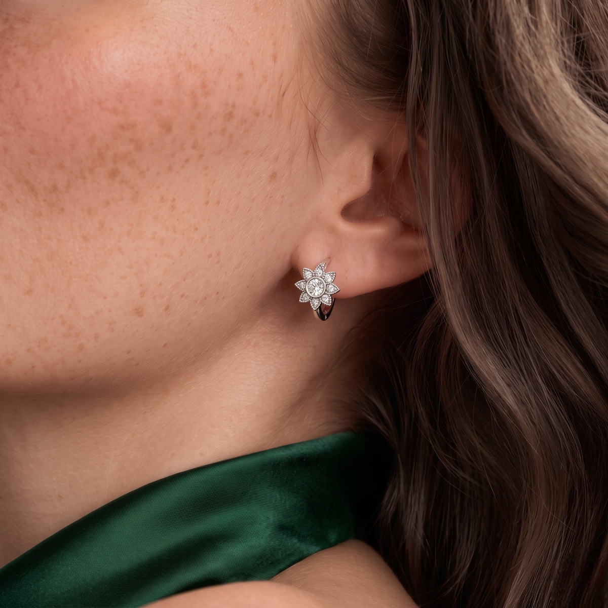 0.62 CT Round Floral Lab Grown Diamond Huggie Earrings, worn on the ear