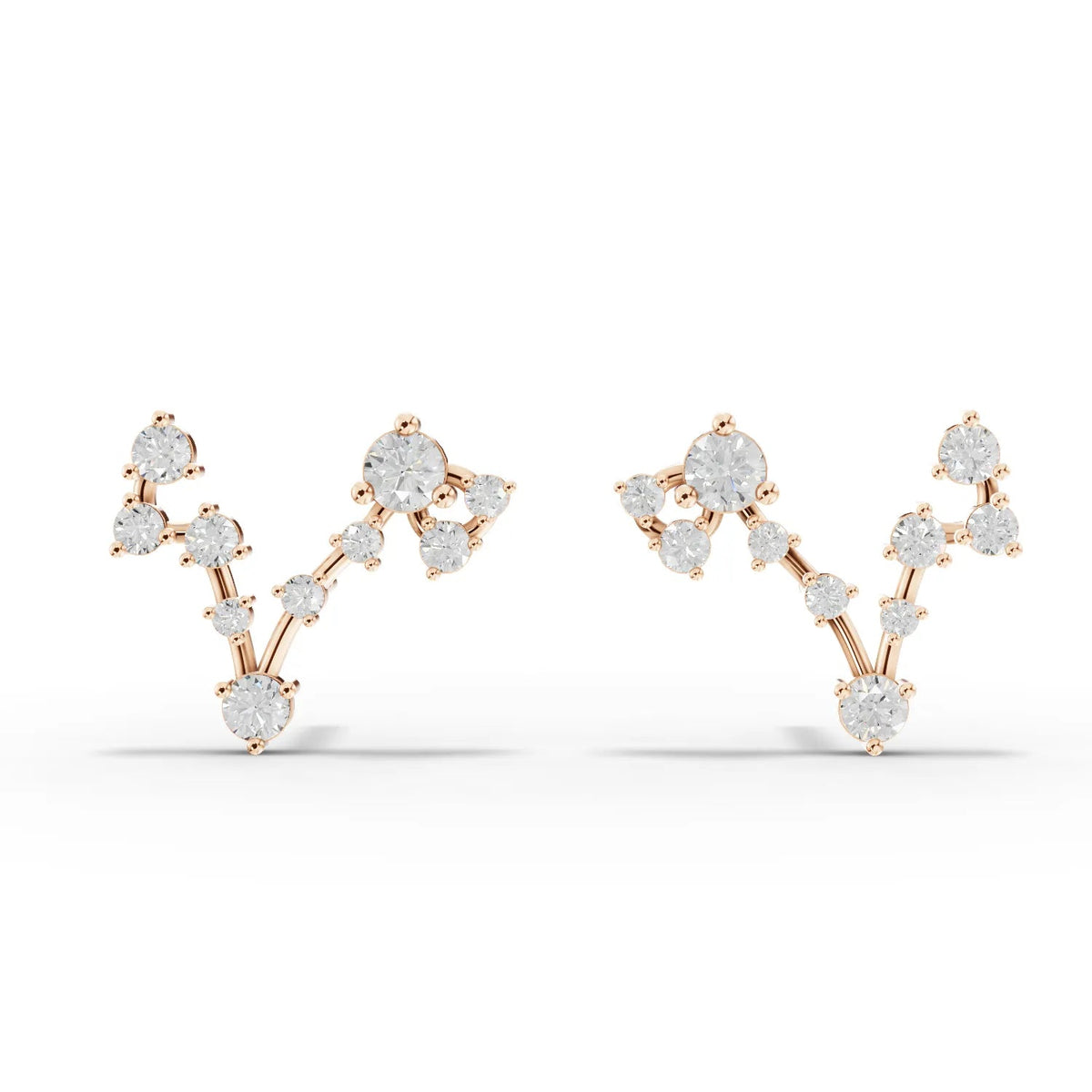 18K gold earrings featuring a linear constellation design with round lab-grown diamonds arranged to depict Pisces.